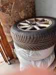 4 Blizzak winter tires with rims Used 1/2 season