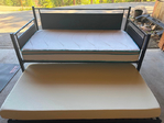 Free Trundle Bed. Metal with padded sides. Two clean mattresses. Easy to assemble<br/>Free Trundle Bed