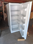 Frigidaire upright freezer.