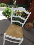 6 nice ladderback kitchen chairs.